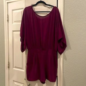 Purple, high neck White House Black Market romper. New with tags.